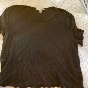 This is a black crop top from Von Maur